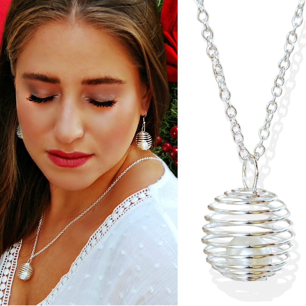 a woman wearing spiral pendant necklace