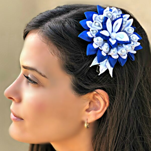 A girl wearing blue silver Kanzashi flower