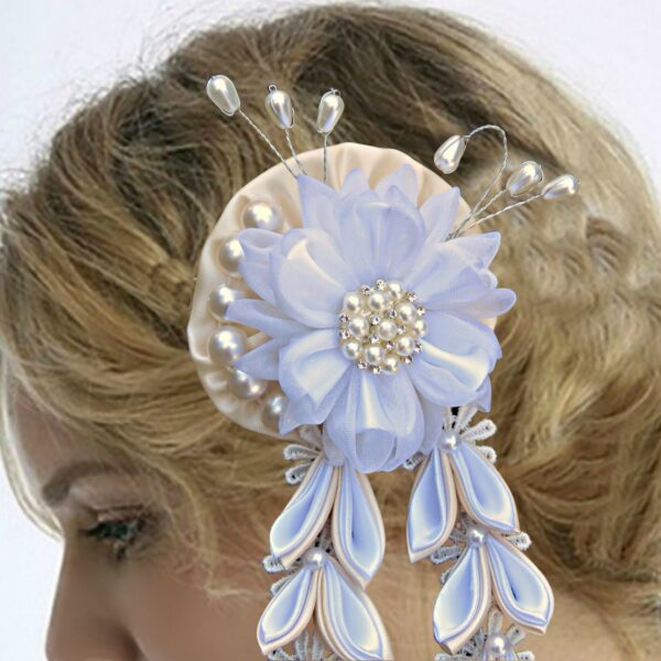a bride wearing Kanzashi white flower hair clip