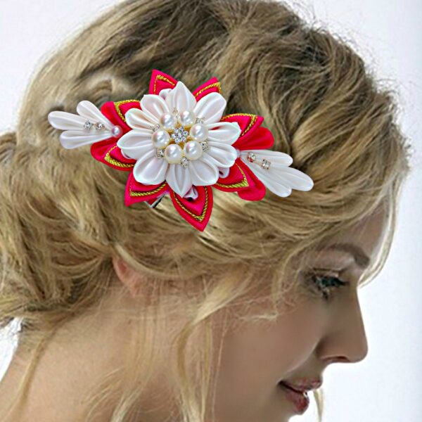 a bride wearing red white fabric hair clip