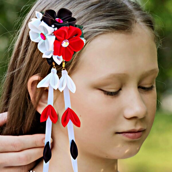 a girl wearing flower dangle hair clip