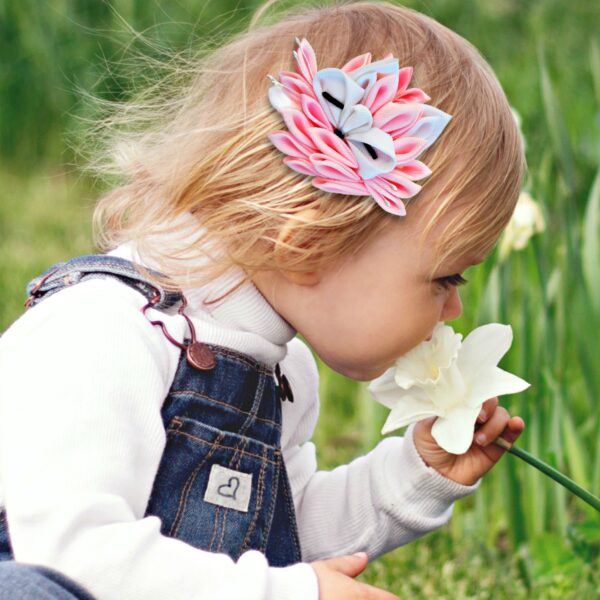 a toddler wearing a cute fox hair clip