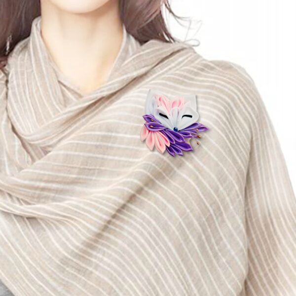 a woman wearing lilac fox brooch