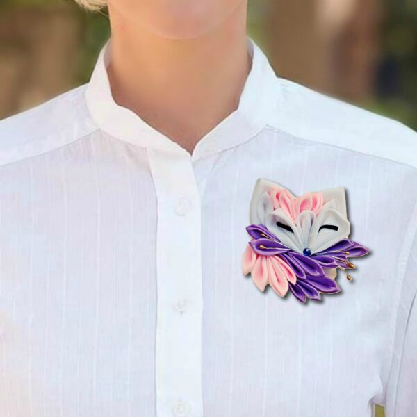 a woman wearing lilac fox brooch