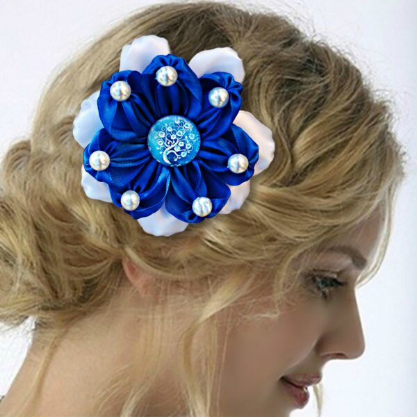 a woman wearing royal blue hair clip