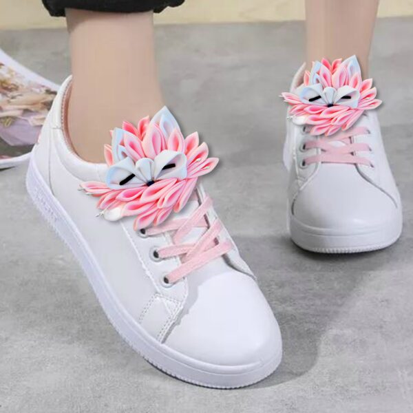 pink fox charms on white shoes