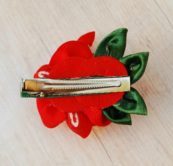 red flower on alligator hair clip