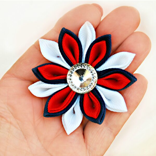 Kanzashi flower in a hand