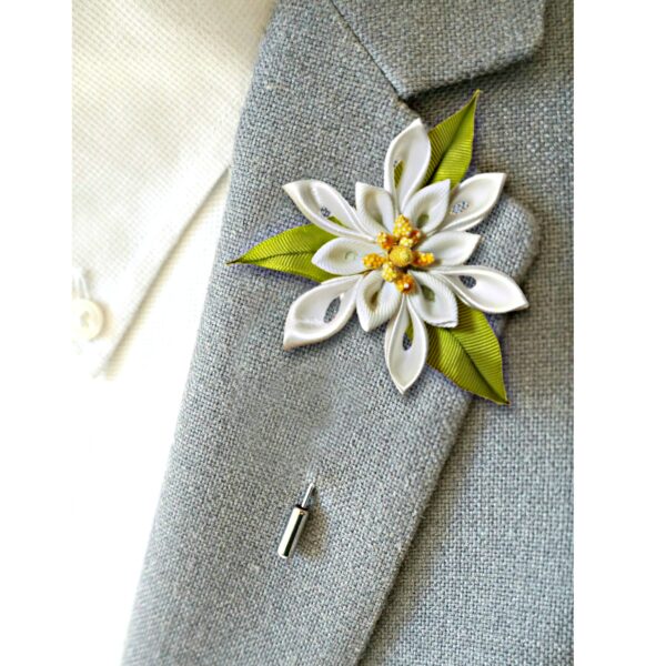 a flower pin on a jacket