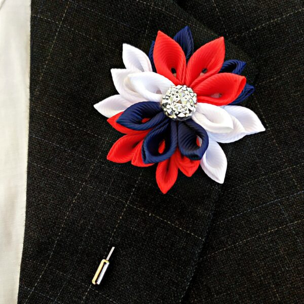 flower lapel pin on a jacket