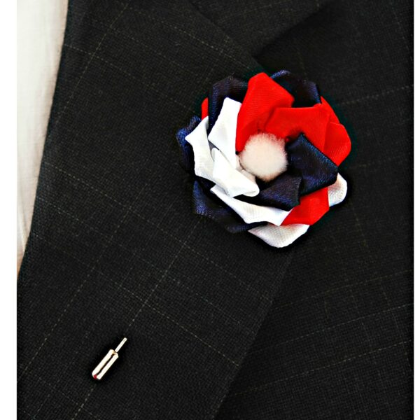 red white blue lapel pin on a jacket