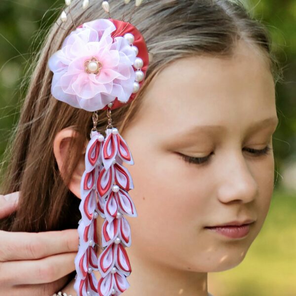a girl wearing Japanese Kanzashi flower dangle hair clip