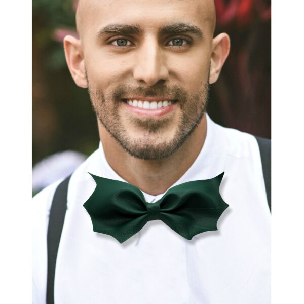 a man wearing a green bat bowtie