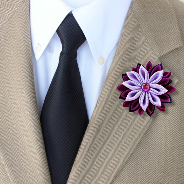 a man wearing a purple lapel pin