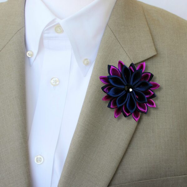 a purple men's brooch on a suit