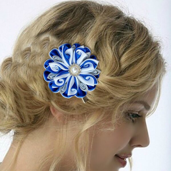 a woman wearing a blue hair clip