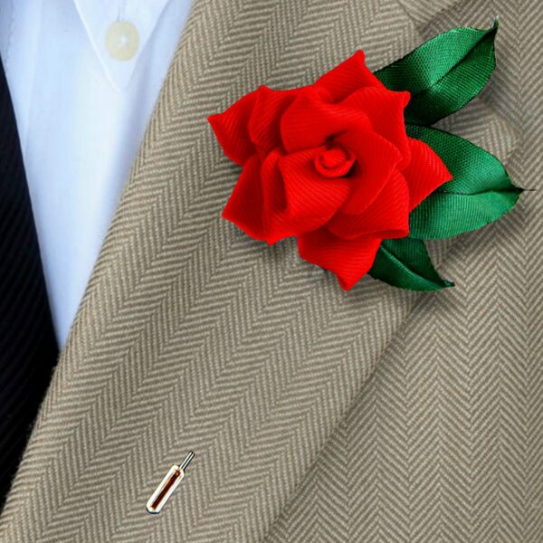 flower lapel pin on a suit