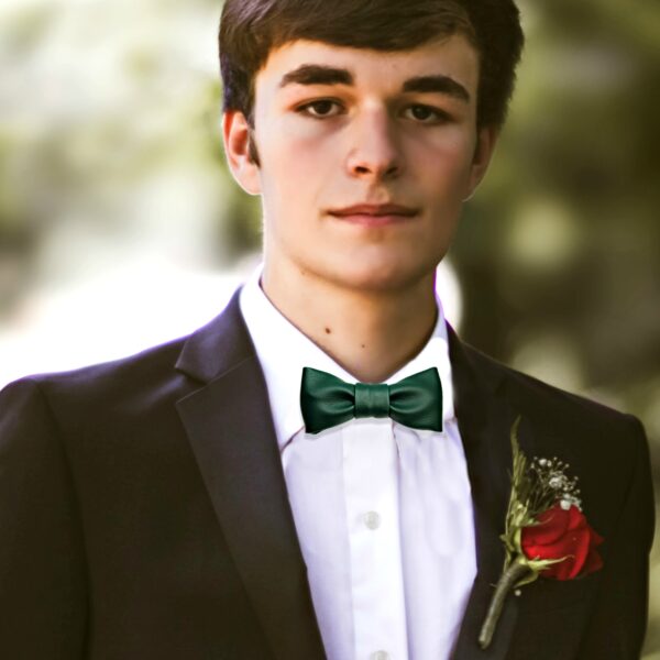 young man wearing green bowtie