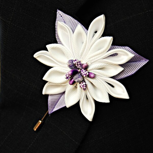 Edelweiss with lilac leaves on a jacket