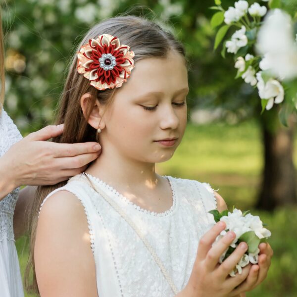a girl wearing flower hair clip