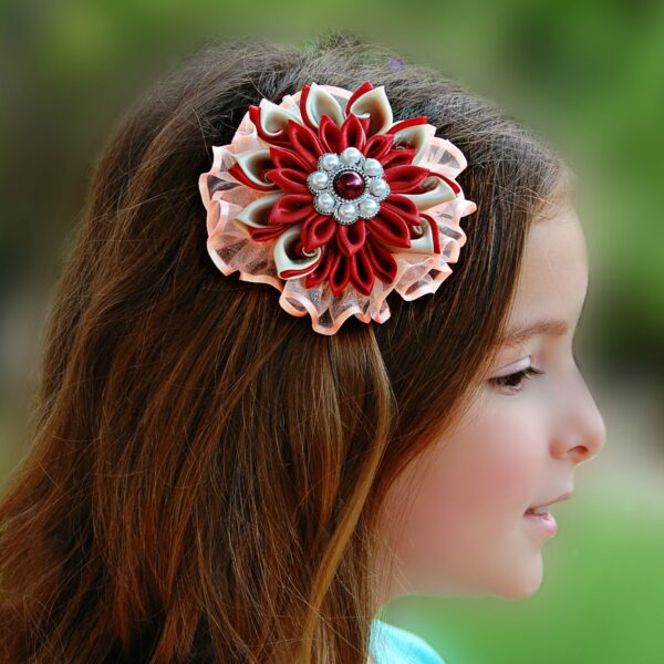 a girl wearing Kanzashi flower coral shades hair clip