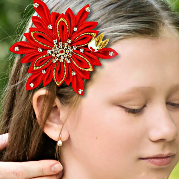 a girl wearing red snowflake hair clip