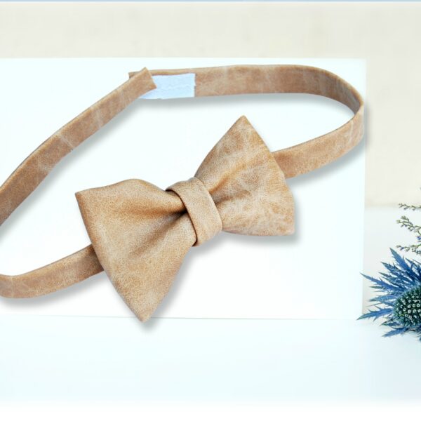 nude color faux leather bow tie