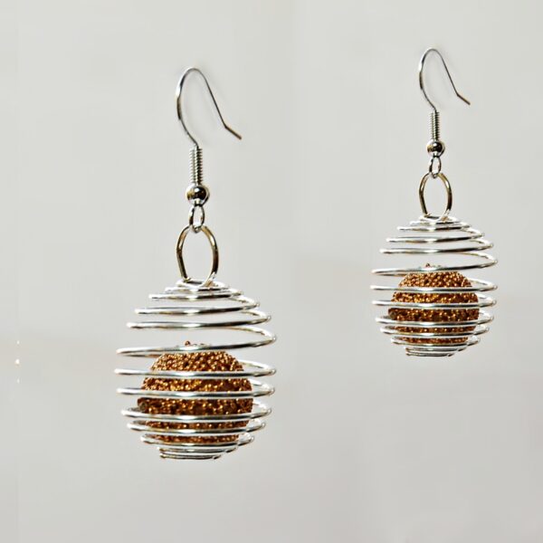 spiral earrings with a gold ball inside