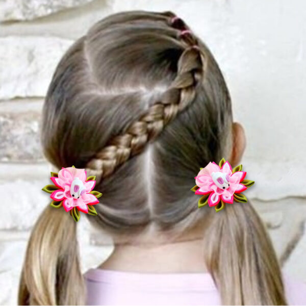 A girl wearing Easter hair bows