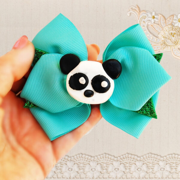 green hair bow with panda